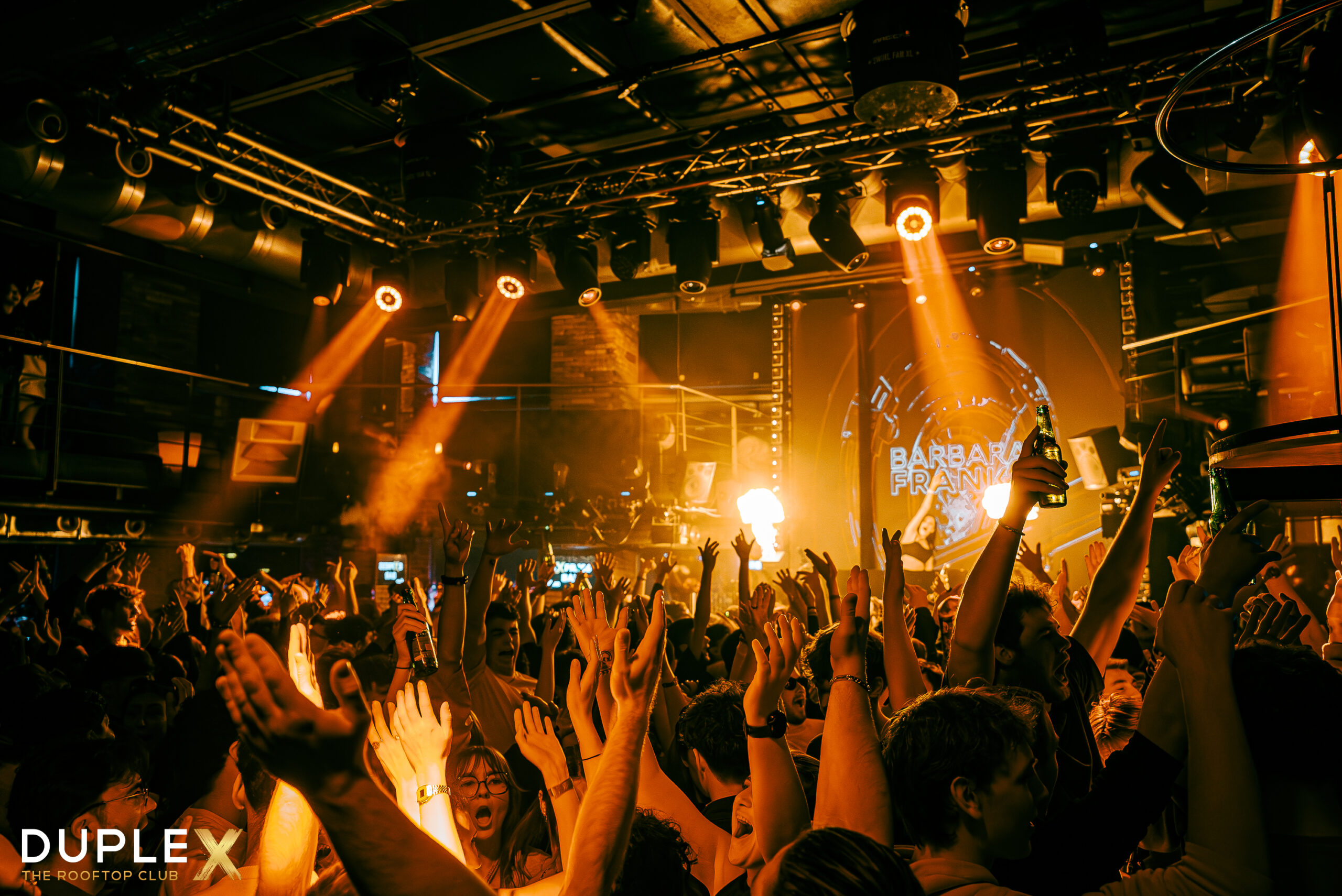 Students partying at DupleX club Prague rooftop